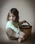 Ethically made toddler leg warmers for movement support