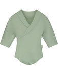 Locally made organic cotton bodysuit for free development