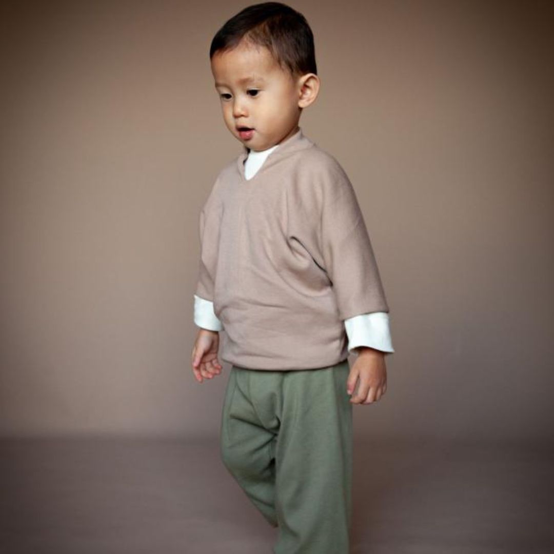 Child wearing HISOPO pants in Rosemary, front view