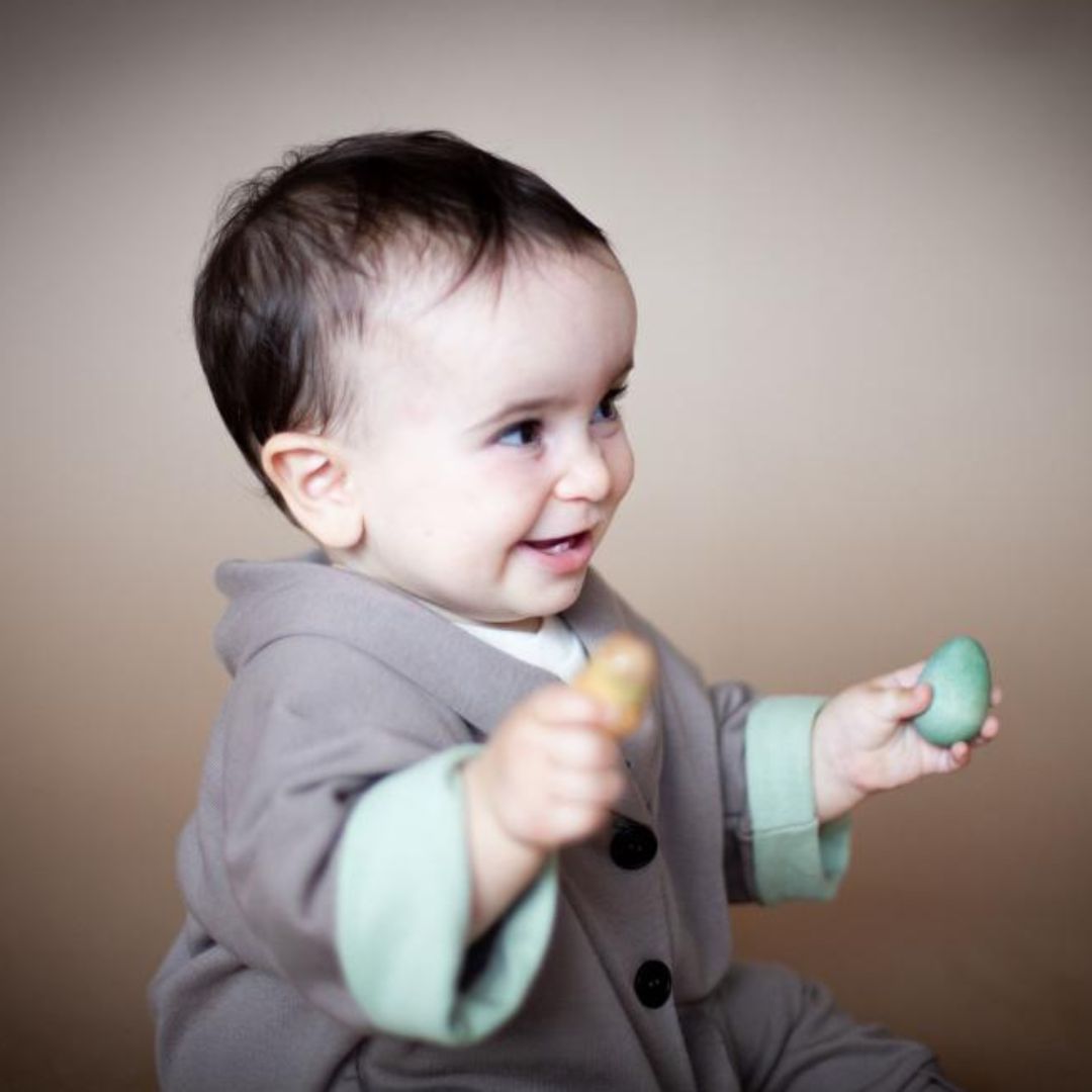 ALMOND jacket in Acorn Brown / Sage — child wearing the jacket
