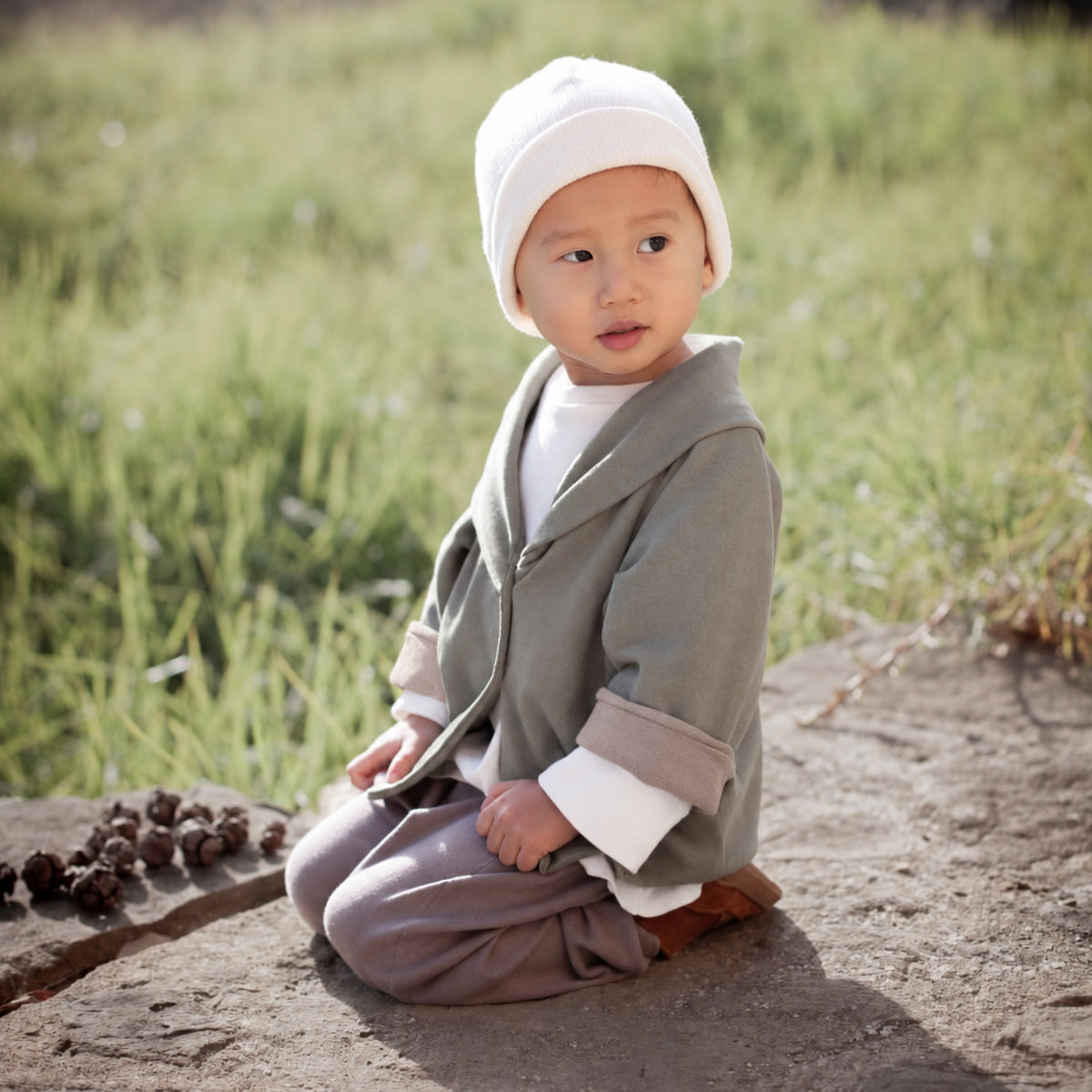ALMOND jacket in Rosemary / Cinnamon — worn by a child