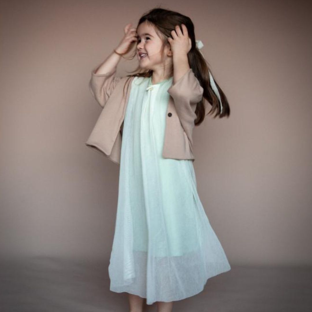 TRIFOLIUM jacket in Cinnamon — child wearing the jacket
