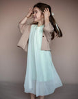 TRIFOLIUM jacket in Cinnamon — child wearing the jacket