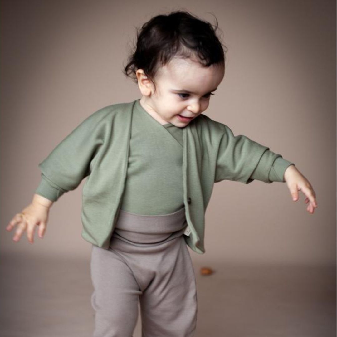 TRIFOLIUM jacket in Rosemary — child wearing the jacket