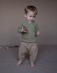 HAZEL double-layer shirt in Rosemary with Cinnamon trousers — worn by a child