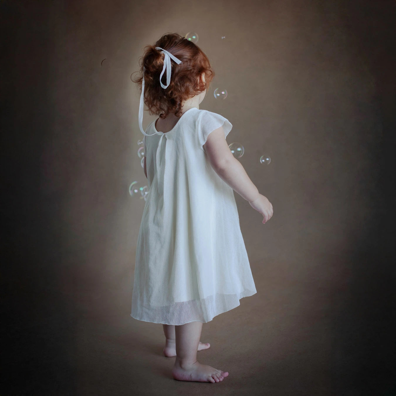 Gender-neutral organic cotton dress for kids