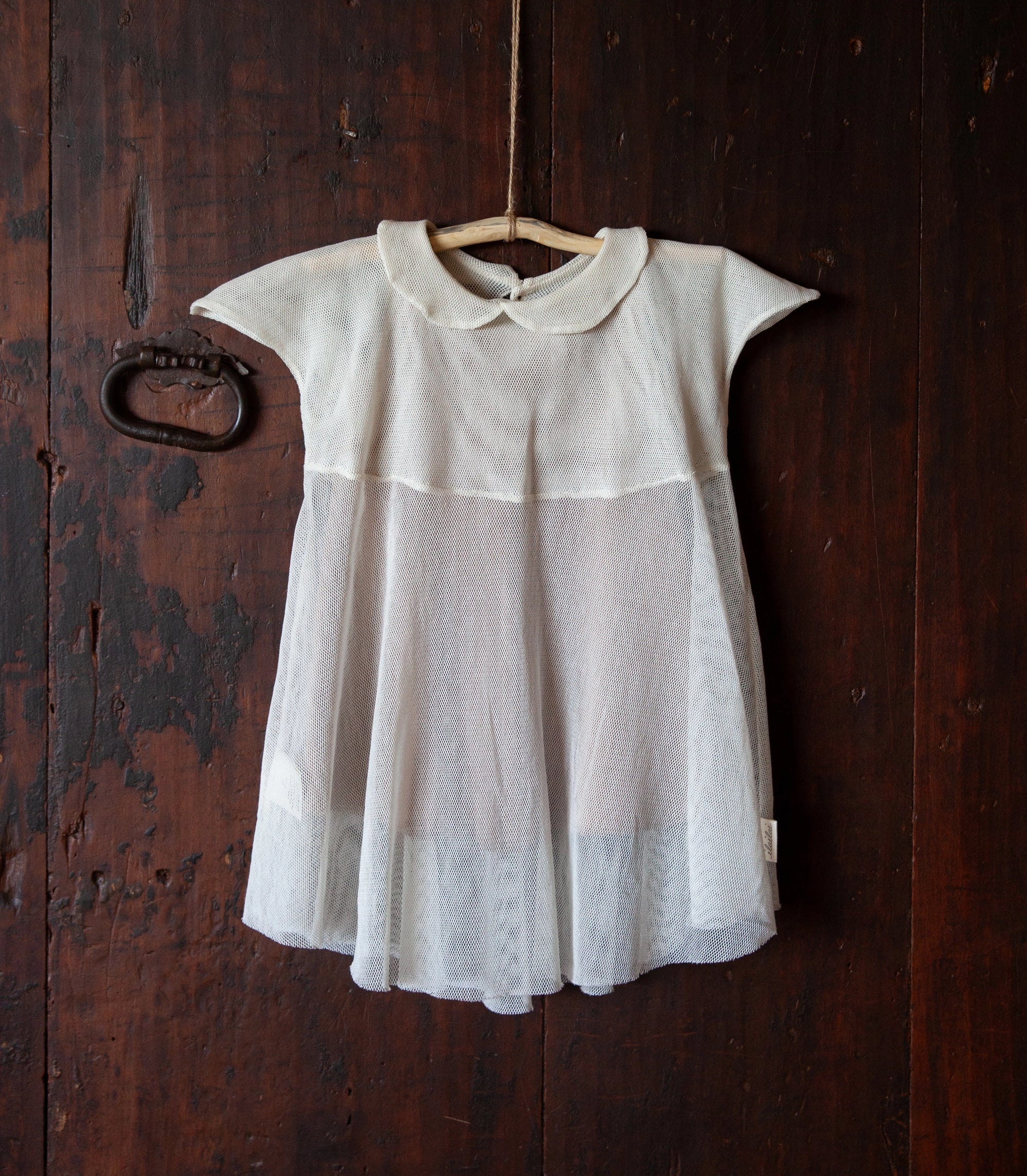 Gentle organic cotton dress for infants