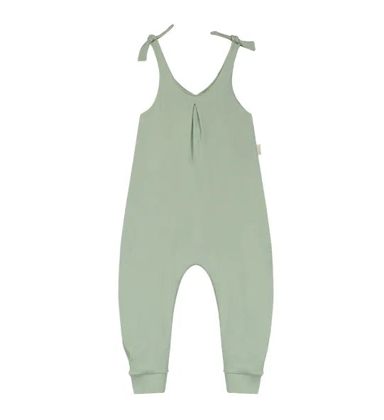 Locally made organic cotton romper for free development