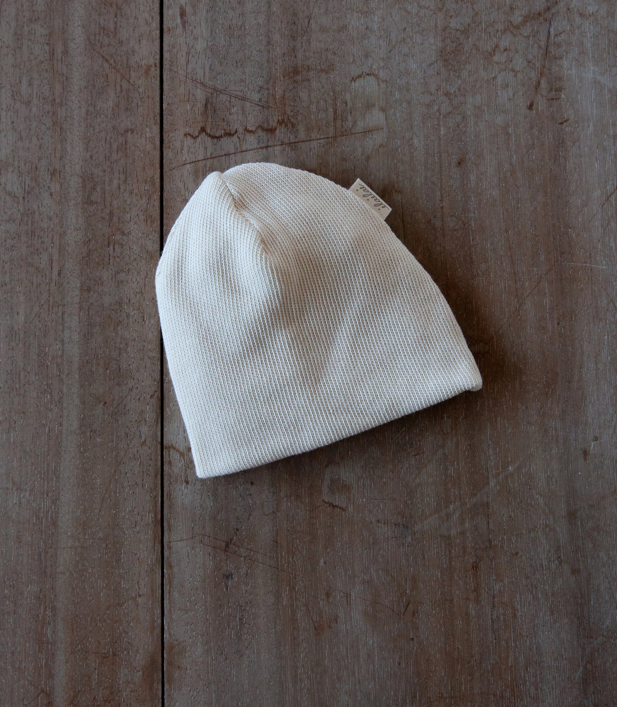 Natural-dyed organic baby bonnet for sensitive skin