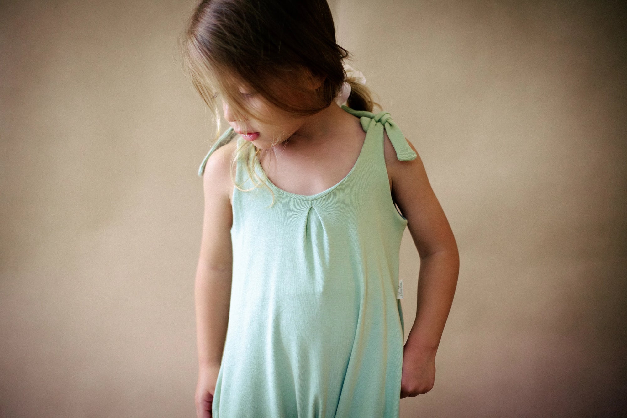 Natural fiber baby jumpsuit for unrestricted exploration